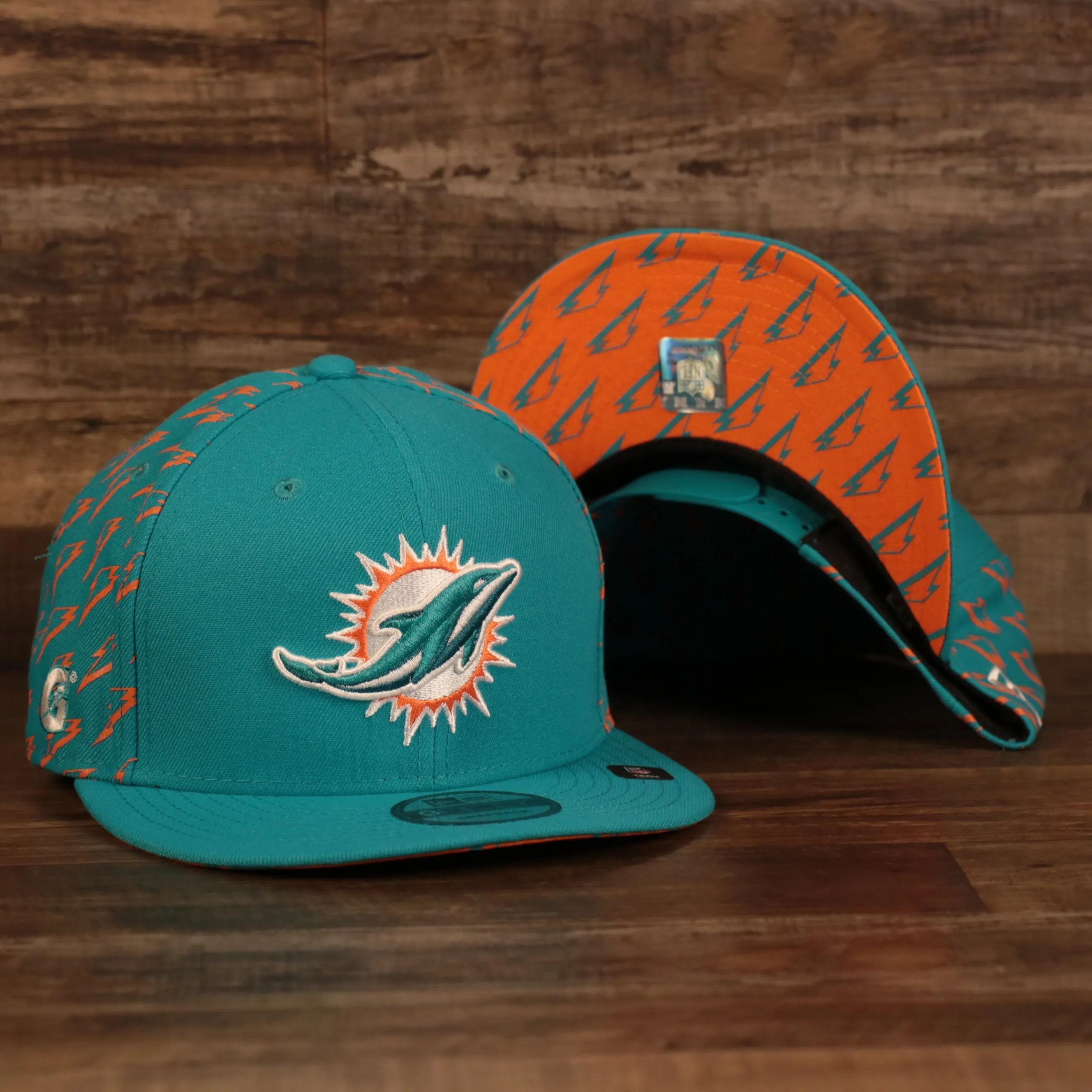 Miami Dolphins x Gatorade Teal 9Fifty Orange Bottom Snapback